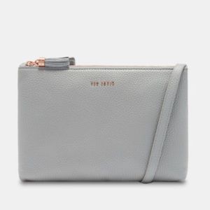 Tassel leather double zip cross body bag